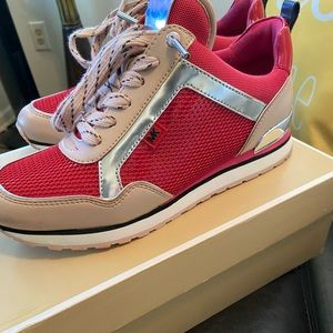 Michael Kors sneakers sz 7.5 used has a coupled marked on front look at all pics